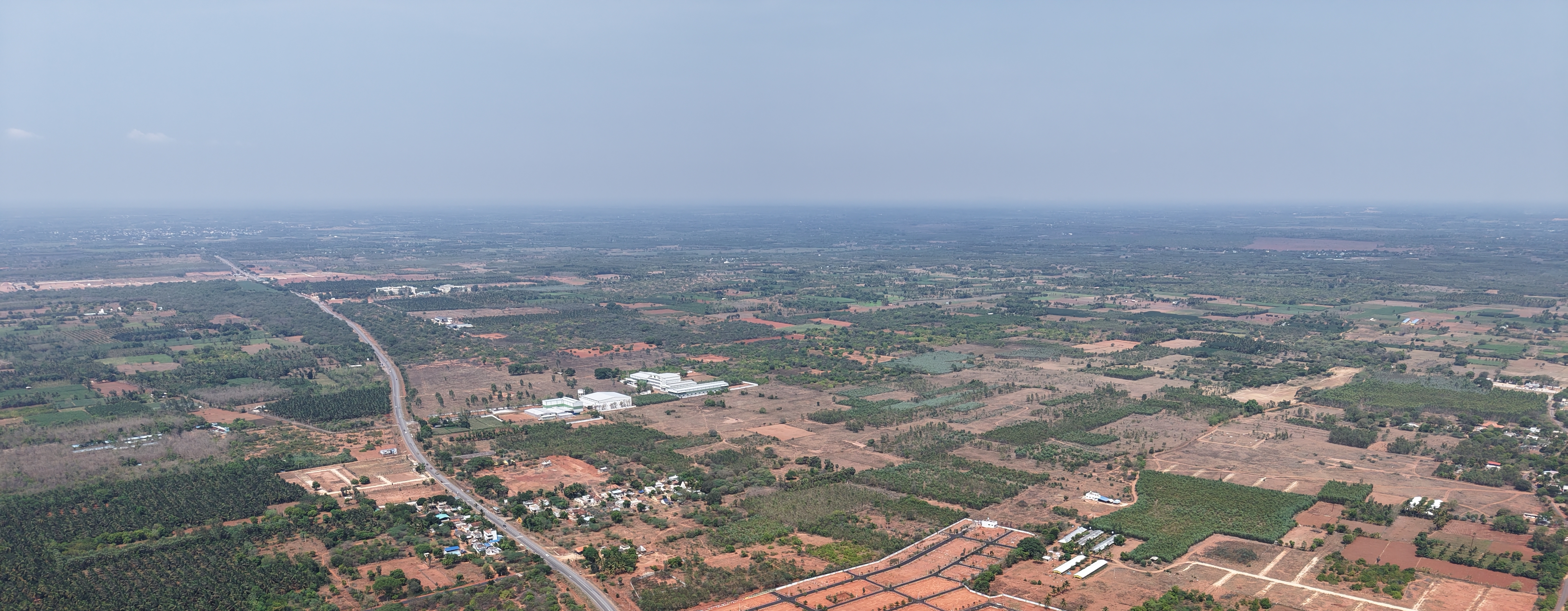 Aerial drone view of Yogham's plotted land development in Pondicherry